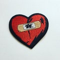 Broken Heart Iron-On Patch, Red Heart Badge, 90s Pop Culture Badge, DIY Embroidery, Embroidered Heart Applique, Love Hurts Patch product logo