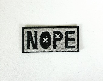Nope Embroidered Iron-On Patch: Pop Culture Applique
