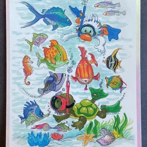 May include: A colorful illustration of a penguin and a turtle wearing scuba gear and swimming with various fish, seahorses, and coral in a blue ocean. The text "Suzy's Zoo" and "www.suzyszoo.com" is at the bottom of the image.