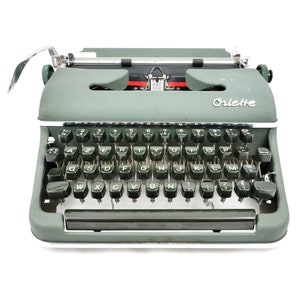 Macchina da scrivere Olympia Oriette SG-3 verde rivisto nastro nuovo