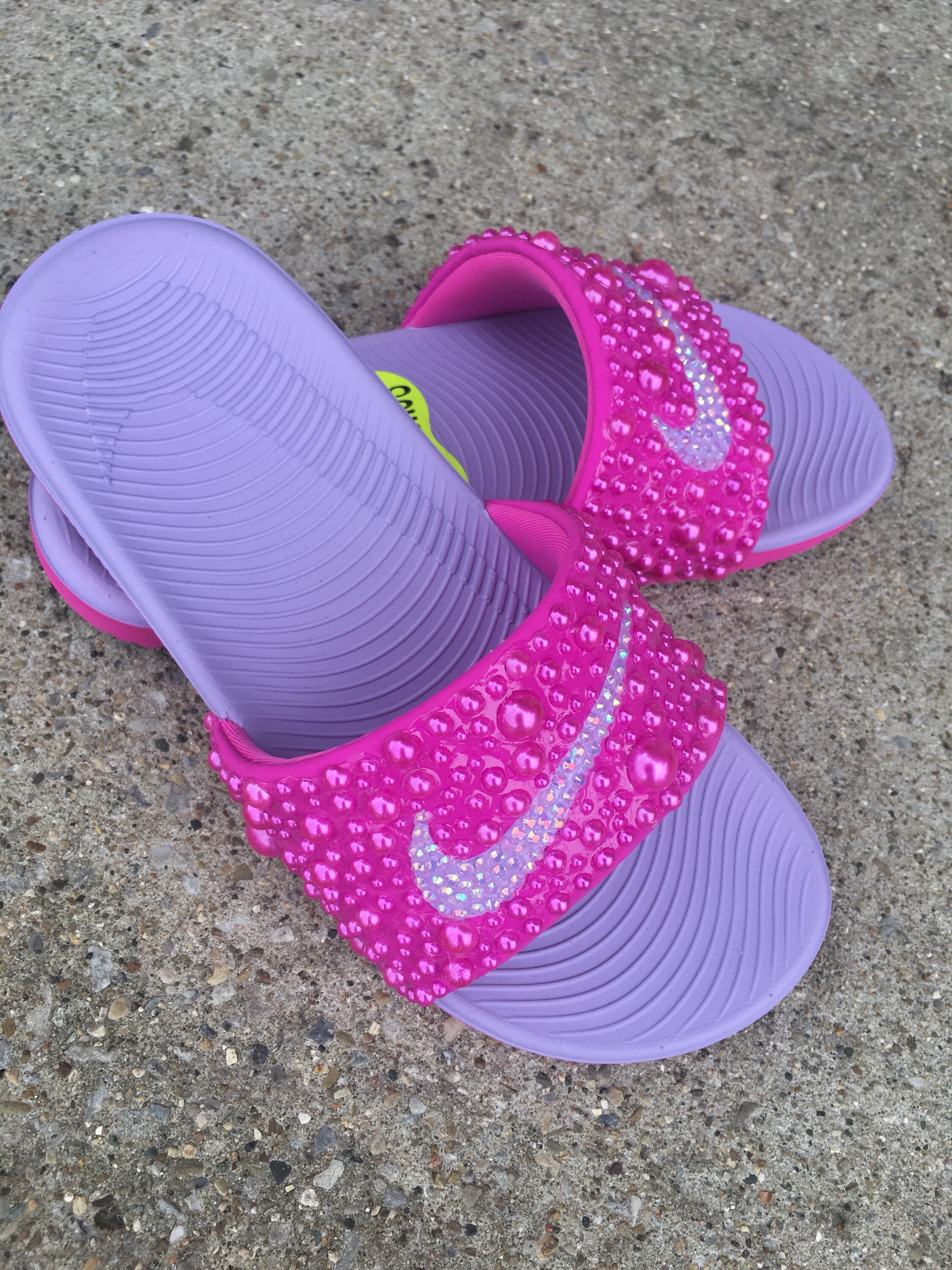 purple nike slides
