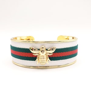 White Leather Cuff Bracelet: Gold Bee Accent, Red & Green Ribbon