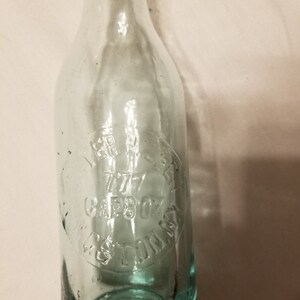 Peter P. Zeeh Kingston, NY 8 oz Bottle. Blue Glass. 8&quot; tall. No manufacturers mark.  Cap 8 oz. Marked 777.  Great Find. Free Shipping USA.