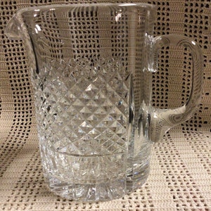 O’Malley (Plain Foot) Pitcher by Galway Crystal of Ireland. 5 3/4” Tall 6 3/4” spout to handle 4” at base. Ex condition. Free shipping USA.