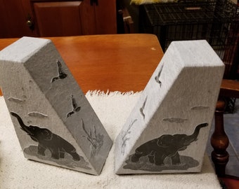 Vintage Soapstone Bookends with Carved Birds and Elephants.  Nice gift idea.  Free Shipping in the U.S.A. 69 Dollars. Nice Black on White.