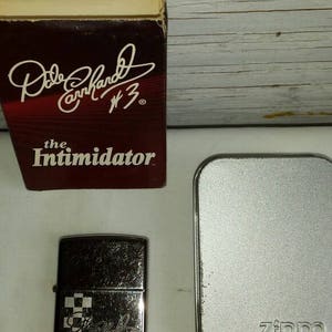 Vintage Advertising Zippo for Nascar and #3 Dale Earnhardt. This lighter is in working cond, and has been lightly used.  Have the tin box.