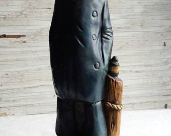 Vintage Chalkware Figurine. No Manufacturers mark. New England Salty Sea Captain by a lamp post. Very-Nice-Cond. 13" tall and 4" wide.