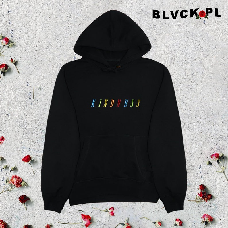 May include: Black hooded sweatshirt with the word "KINDNESS" spelled out in rainbow colors on the front.