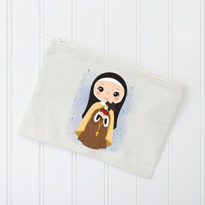 May include: A white canvas zippered pouch with a colorful illustration of a young girl wearing a brown and white habit and holding a bouquet of flowers. The girl has dark hair and brown eyes.