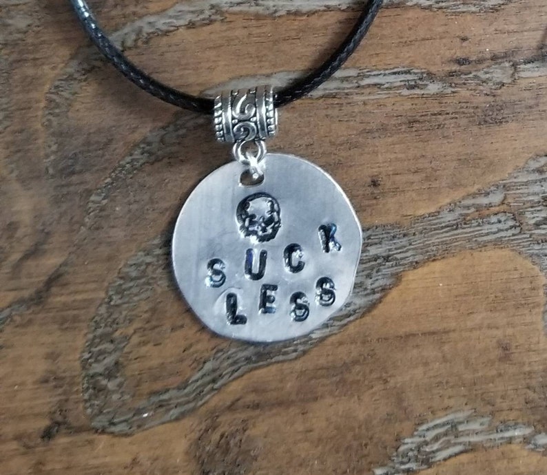 Suck Less Skull Necklace
