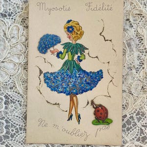 Postal vintage de 1920 de la Marque Deposee - Myosotis Fidelite - Hermosa chica vestida