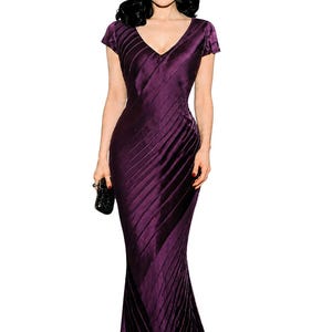 May include: A floor-length, plum-colored dress with a V-neckline and short sleeves. The dress features diagonal pleats that run from the shoulders to the hem. A small, black clutch is held in the hand.