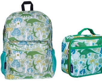 May include: A green and blue backpack and lunch bag set with a dinosaur and tree pattern. The backpack has a large main compartment and a front pocket. The lunch bag has a zipper closure and a handle.