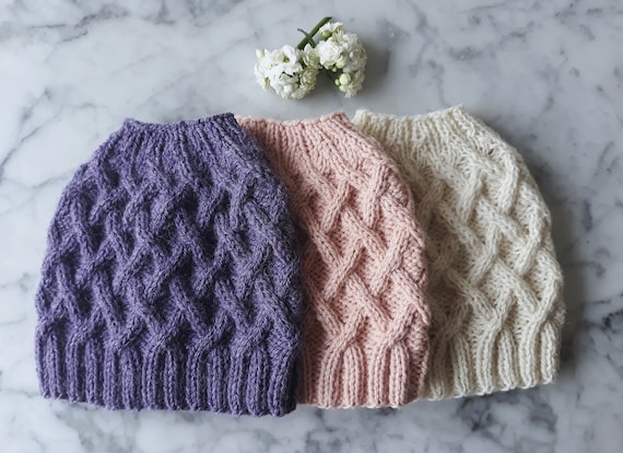 Knitting pattern: Aran Messy Bun Hat. Digital download. Knit your own hat. Knit hat pattern. Instant download PDF. Cable knit hat pattern.