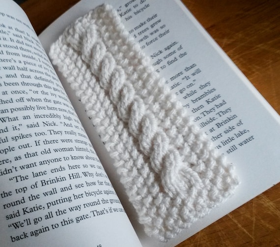 Knit bookmark: Aran handknitted bookmark. Made in Ireland. Cable knit. Options for customisation. Traditional white yarn. Original design.