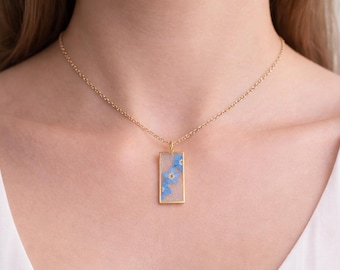Real flowers heart necklace Forget me not in uv resin. Silver forget-me-not heart pendant. Resin jewelry. Dried pressed flowers