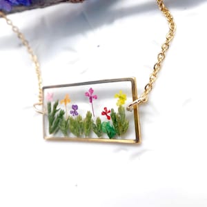 Women's gold necklace with real flowers and Queen Anne's lace. Dried floral jewelery pressed in resin. Unique handmade jewelry accessories