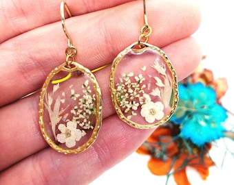 Women's gold brass pendant hoop earrings with real resin flower pendant. Pressed dried flower resin jewelry. Unique gift for her