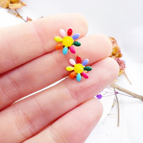 Small flower earrings on the gold lobe. Rainbow glazed daisies flowers. Hypoallergenic jewelery in gold steel. Gift idea.