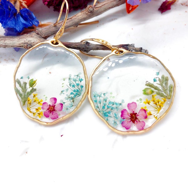 Women's gold brass pendant hoop earrings with real resin flower pendant. Pressed dried flower resin jewelry. Unique gift for her