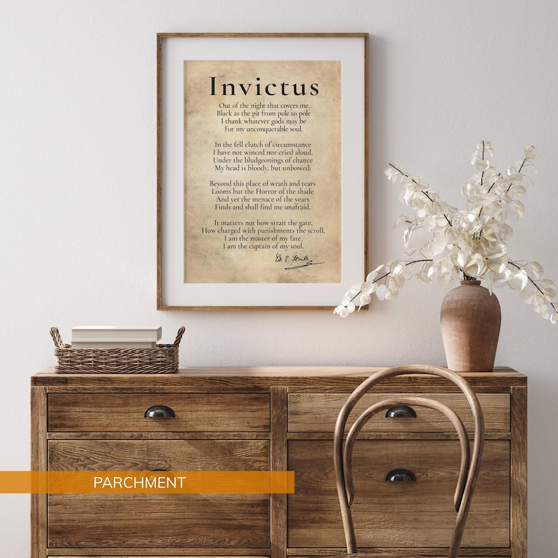 a framed quote of the Roman poet Virgil, "Invictus," displayed on a wooden dresser. The quote is accompanied by a vase of white flowers and a wicker basket.