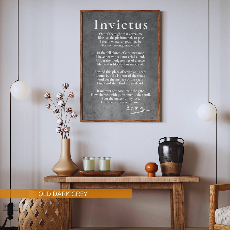a wooden table with a vase of flowers, candles, and a black vase, along with a framed quote in black text on a white background.