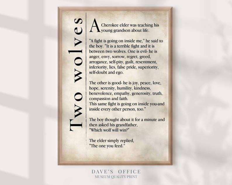 A framed print with text and illustrations of two wolves, one evil and one good, with a boy thought about a minute and asking his grandfather about the wolf question.