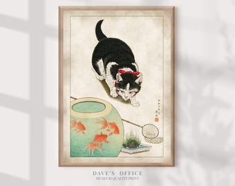 May include: A framed print of a Japanese-style illustration featuring a black and white cat with a red bow, gazing at a fishbowl with goldfish. The print has a light beige background and a wooden frame. The text "DAVE'S OFFICE MUSEUM QUALITY PRINT" is at the bottom.