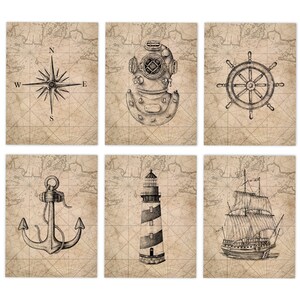 May include: Set of six nautical-themed prints featuring a compass rose, diving helmet, ship's wheel, anchor, lighthouse, and sailboat. Each print is a black and white illustration on a vintage map background, creating a classic maritime aesthetic.