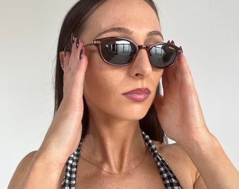 Deadstock Y2K vintage brown Sunglasses with polarised lenses and gold detailing sides