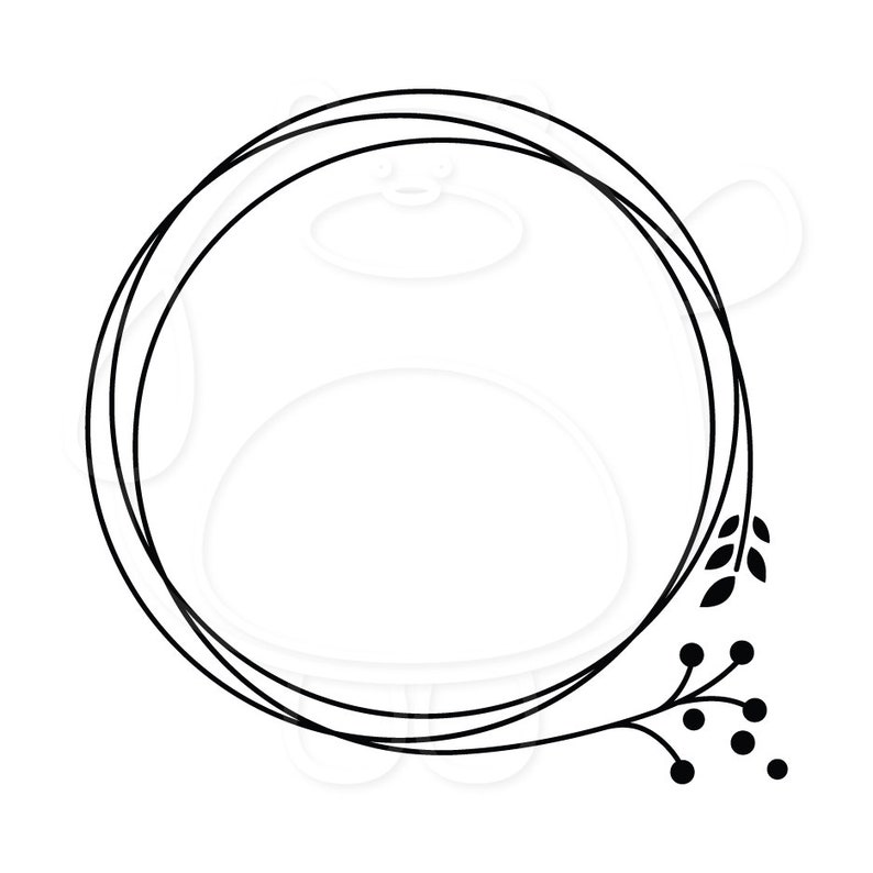 May include: A black and white circular frame with a double border and a simple floral design on the right side.