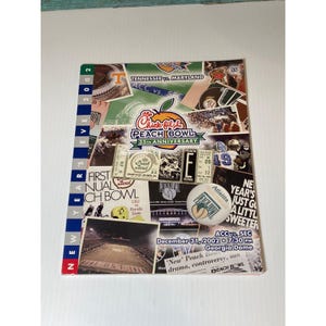 May include: A collage-style program cover for the Chick-fil-A Peach Bowl, 35th Anniversary. The cover features images of football players, the Peach Bowl logo, and the text "Tennessee vs. Maryland." A button with the Peach Bowl logo is also visible.