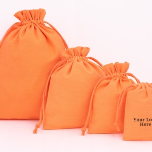 100 sacs d'emballage de bijoux avec cordon orange, pochette à bijoux, sac cadeau en coton, sac cadeau de mariage, sac à poussière