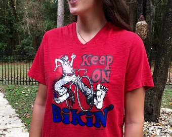 Vintage Red Old Navy soft and worn Small V neck with Kool Hippie Keep on Bikin' 1973 Rat's Hole heat transfer Rare fluorescent design