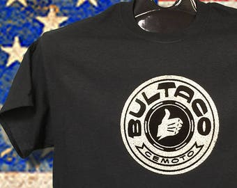 Bultaco Vintage MX. Printed in the 80's this transfer never sold and stored away over 30 years. Printed on a New Black 100% All Sizes cemoto