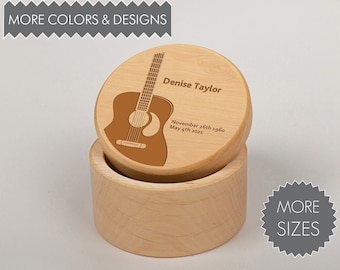 May include: A wooden box with a lid featuring a laser-engraved acoustic guitar and the text "Denise Taylor, November 26th 1960, May 4th 2023".