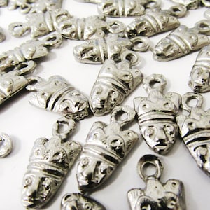 Milagros Charms, pack of 50 man&#39;s face, king charm, assorted colors