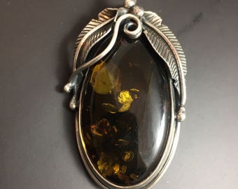 Large sterling silver pendant with amber, weight 16.8 grams