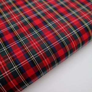 100% Cotton Poplin Red Royal Stewart Style - Tartan fabric by the metre. Width 146 cm / 57.5&#39;&#39;. Suitable for shirts and craft. Lightweight.