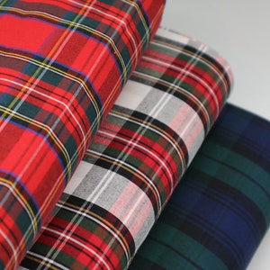100% Cotton Tartan width 148 cm/58&#39;&#39;, weight 110 gsm. Tartan fabric by the metre. Plus matching thread.
