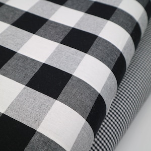 100% Cotton Calico Fabric Black Gingham, 5 cm squares. Width 144 cm / 57&#39;&#39;, weight 177 gsm.  Medium Weight as Fabric for Clothing.