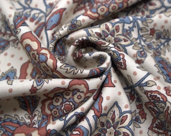 Tejido de sarga de viscosa floral: Ananda 100% sarga de viscosa - Multicolor, color crema. Ancho 140 cm / 55''.