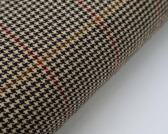 100% Wool British Brown Tartan Houndstooth Fabric. Width 150cm / 59'', weight 253 gsm. Suitable for clothing and decoration.