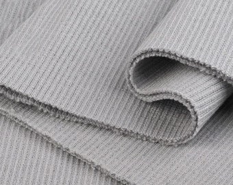 Light Grey Rib Knit. Tube 2 x 38 cm, 97% Cotton, 3 perc Elastane. Ribbing fabric for cuffs, waistband, collars. Weight 340gsm.