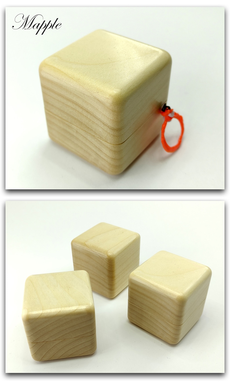 May include: Three wooden boxes with lids. The boxes are square and have a light wood finish. The boxes are all closed and are sitting on a white surface.
