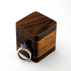 Luxury engagement ring box from merbau wood. Unique wooden ring box proposal. Wood ring box for wedding ceremony.