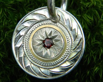 Hand Engraved "Starburst" Sterling Silver Pendant with 24 Karat Gold and Garnet