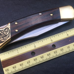 Custom Hand-Engraved Inked Flowing Scroll Buck 110 Folding Knife With Personalization Option image 9