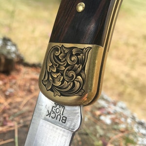 Custom Hand-Engraved Inked Flowing Scroll Buck 110 Folding Knife With Personalization Option image 1