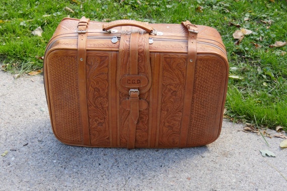 tooled leather suitcase